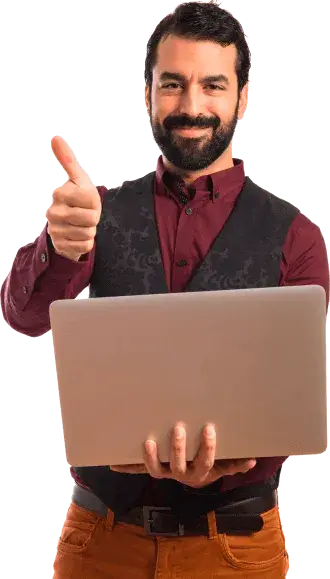 Confident male instructor in maroon shirt and vest giving thumbs-up while holding laptop – representing expert trainers at GS Trainings Pakistan.