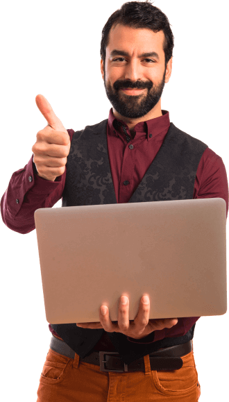 Confident male instructor in maroon shirt and vest giving thumbs-up while holding laptop – representing expert trainers at GS Trainings Pakistan.